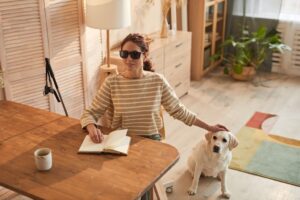 blind woman and her guide dog