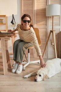 blind woman and her guide dog